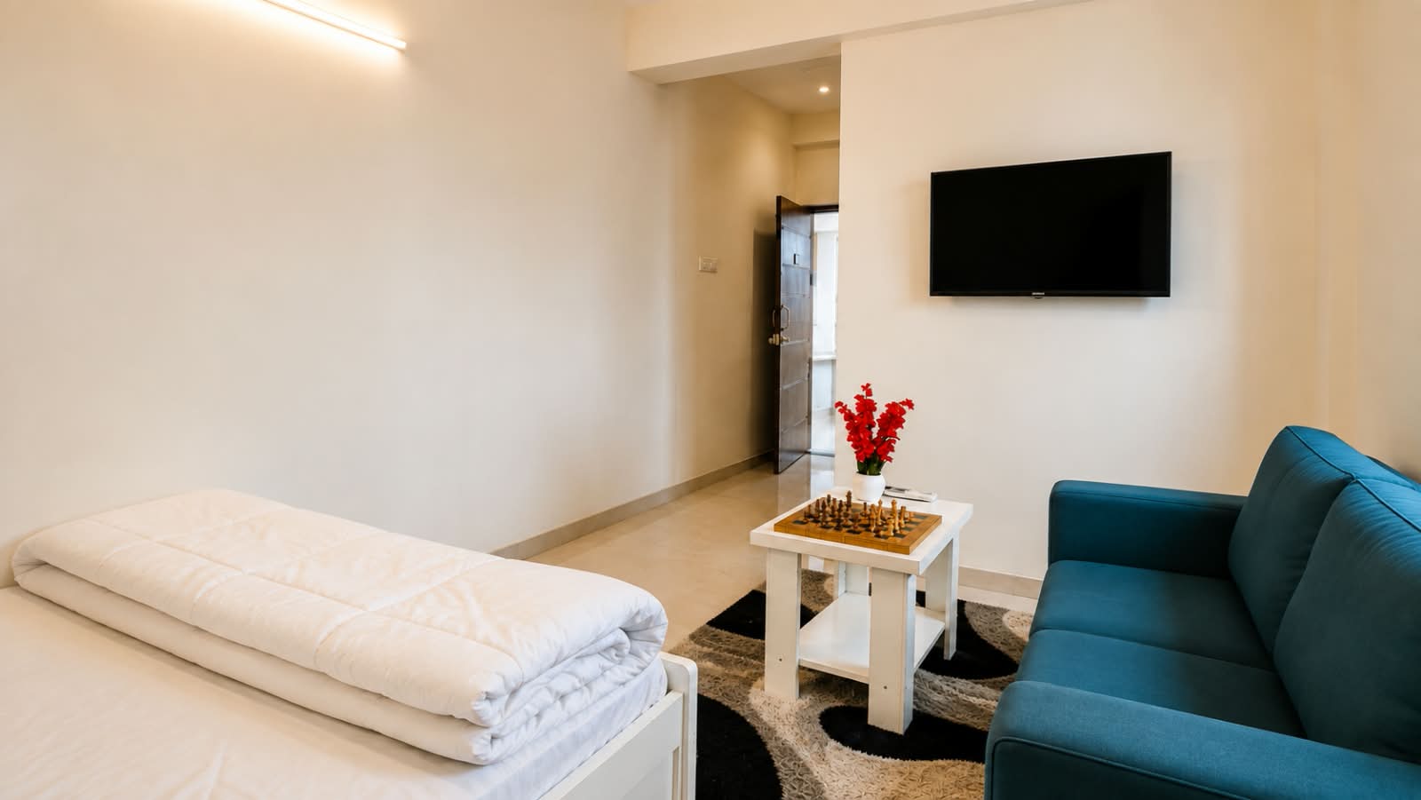 Private couple room with double bed, wardrobe and study desk — photo 1 of 3